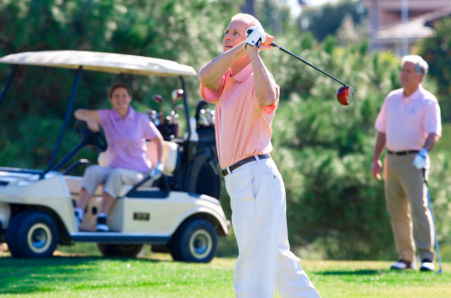 Golfer enjoying clear distance vision after trifocal lens
