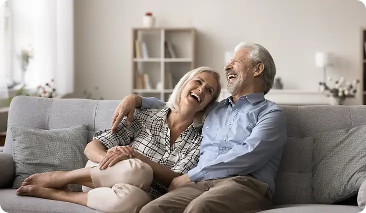 A senior couple who received ongoing eye care that is integrated with their surgical care.